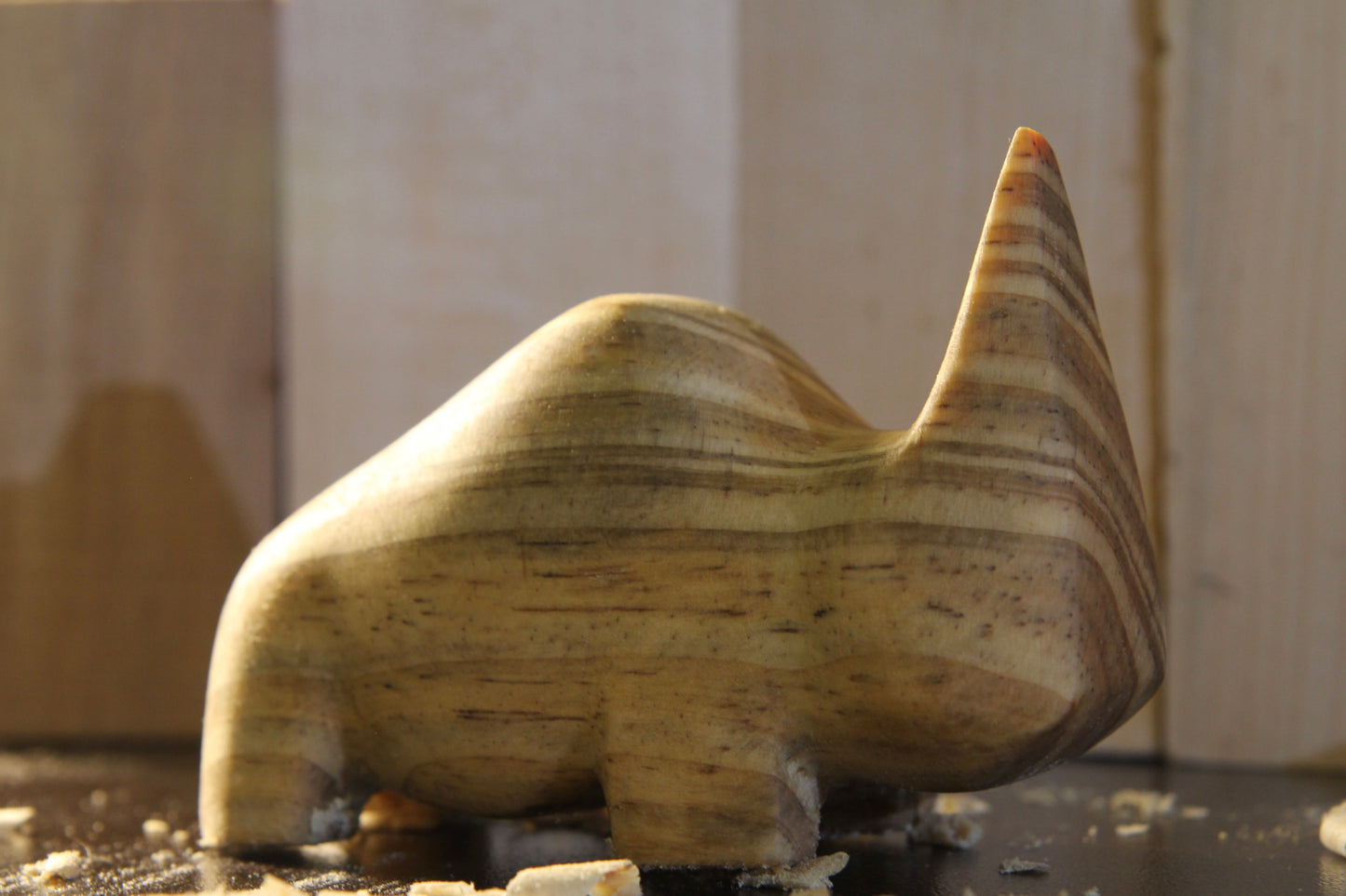 Hand-Carved Wooden Abstract Rhino Sculpture